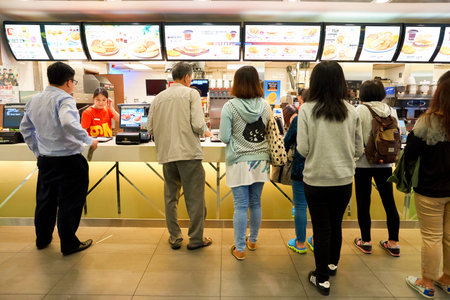 HONG KONG - CIRCA NOVEMBER, 2016: counter service in a McDonald's restaurant in Hong Kong....