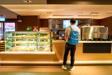 HONG KONG - CIRCA NOVEMBER, 2016: a McCafe in Hong Kong. McCafe is a coffee-house-style food and drink chain, owned by McDonald's.のeditorial素材