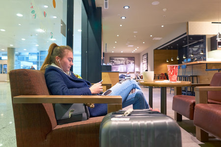 SAINT PETERSBURG, RUSSIA - 10 NOVEMBER, 2016: inside of Starbucks at Pulkovo Airport. Starbucks Corporation is an American coffee company and coffeehouse chain.のeditorial素材