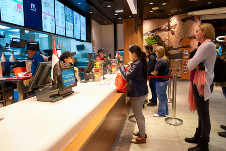 DUBAI, UAE - CIRCA NOVEMBER, 2016: counter service in a McDonald's restaurant at Dubai International...