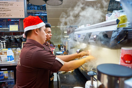 DUBAI, UAE - CIRCA NOVEMBER, 2016: staff at a Costa Coffee branch at Dubai international Airport. Costa Coffee is a British multinational coffeehouse company, it is the second largest coffeehouse chain in the world behind Starbucks and the largest in Britのeditorial素材