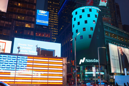 NEW YORK, NY - MARCH 14, 2016: Nasdaq at Times Square. The Nasdaq Stock Market is an American stock exchangeのeditorial素材