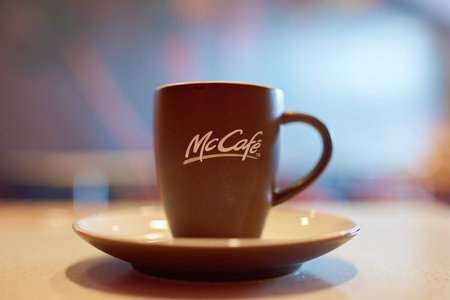 SHENZHEN, CHINA - CIRCA DECEMBER, 2016: close up shot of a cup at McCafe. McCafe is a coffee-house-style food and drink chain, owned by McDonald's.のeditorial素材