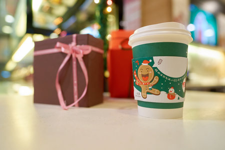 SHENZHEN, CHINA - CIRCA DECEMBER, 2016: McDonald's holday cup at McCafe in Shenzhen. McCafe is a coffee-house-style food and drink chain, owned by McDonald's.のeditorial素材