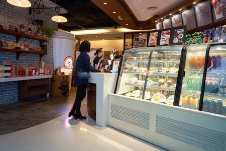 SHENZHEN, CHINA - CIRCA DECEMBER, 2016: a Pacific Coffee branch in Shenzhenのeditorial素材