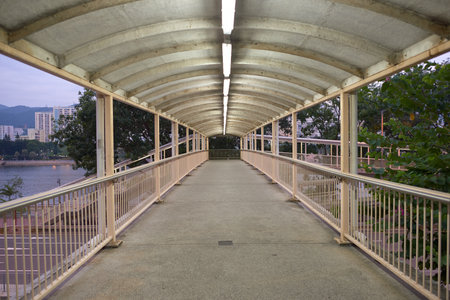 A footbridge in Hong Kong in the morning.のeditorial素材