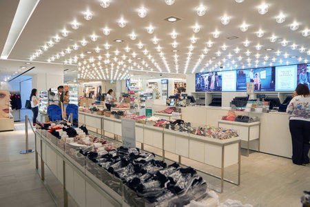 HONG KONG - CIRCA NOVEMBER, 2016: inside H & M store in Hong Kong. H & M Hennes & Mauritz AB is a Swedish multinational retail-clothing company, known for its fast-fashion clothing.のeditorial素材