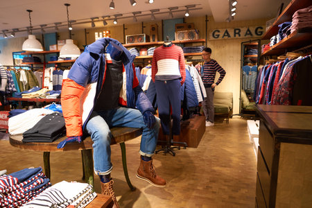 HONG KONG - CIRCA NOVEMBER, 2016: inside a Tommy Hilfiger store in Hong Kong. Shopping is a widely popular social activity in Hong Kong.のeditorial素材