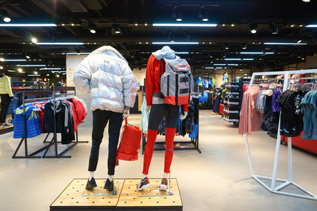 HONG KONG - CIRCA NOVEMBER, 2016: inside Adidas store in Hong Kong. Adidas AG is a German multinational corporation that designs and manufactures shoes, clothing and accessories.のeditorial素材
