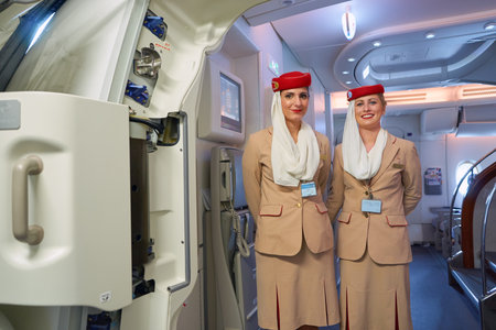 HONG KONG - CIRCA NOVEMBER, 2016: Emirates crew members on board of A380. Emirates is one of two...