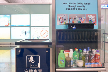 HONG KONG - CIRCA NOVEMBER, 2016: new rules for taking liquids through security at Hong Kong International Airport.のeditorial素材
