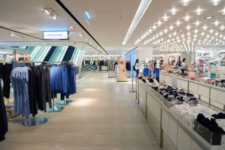 HONG KONG - CIRCA NOVEMBER, 2016: inside H & M store in Hong Kong. H & M Hennes & Mauritz AB is a Swedish multinational retail-clothing company, known for its fast-fashion clothing.のeditorial素材