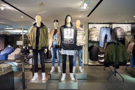 HONG KONG - CIRCA NOVEMBER, 2016: inside H & M store in Hong Kong. H & M Hennes & Mauritz AB is a Swedish multinational retail-clothing company, known for its fast-fashion clothing.のeditorial素材