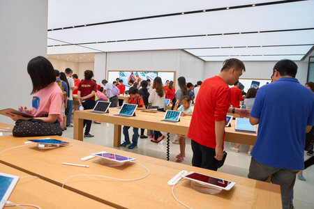 HONG KONG - CIRCA NOVEMBER, 2016: inside Apple store. Apple is an American multinational technology...