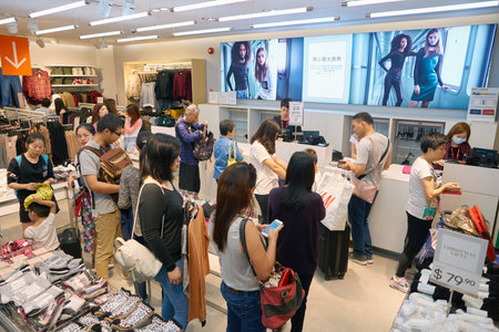 HONG KONG - CIRCA NOVEMBER, 2016: inside H & M store in Hong Kong. H & M Hennes & Mauritz AB is a Swedish multinational retail-clothing company, known for its fast-fashion clothing.のeditorial素材