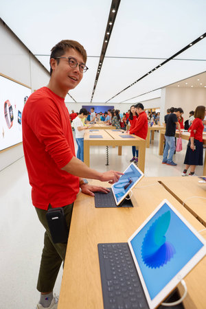 HONG KONG - CIRCA NOVEMBER, 2016: inside Apple store. Apple is an American multinational technology company.のeditorial素材
