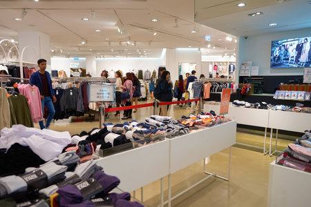 HONG KONG - CIRCA NOVEMBER, 2016: inside H & M store in Hong Kong. H & M Hennes & Mauritz AB is a Swedish multinational retail-clothing company, known for its fast-fashion clothing.のeditorial素材