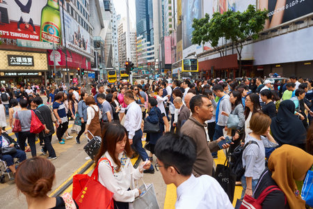 HONG KONG - CIRCA NOVEMBER, 2016: crowd of people walking crossing road in Hong Kong.のeditorial素材