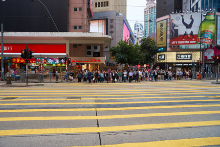 HONG KONG - CIRCA NOVEMBER, 2016: crowd of people waiting for cross a street in Hong Kong.のeditorial素材