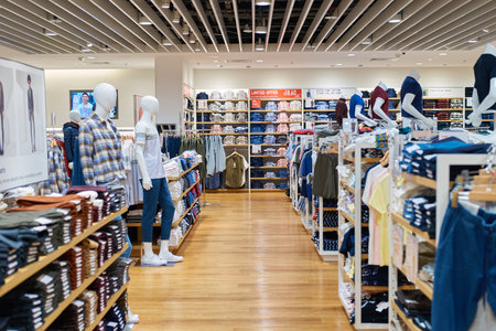 SINGAPORE - CIRCA SEPTEMBER, 2016: inside Uni Qlo store at Singapore Changi Airport. Uniqlo Co.,...