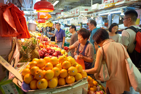 HONG KONG - OCTOBER 25, 2015: a fruit stall in a market at Kennedy Town. Kennedy Town is at the western end of Sai Wan on Hong Kong Islandのeditorial素材