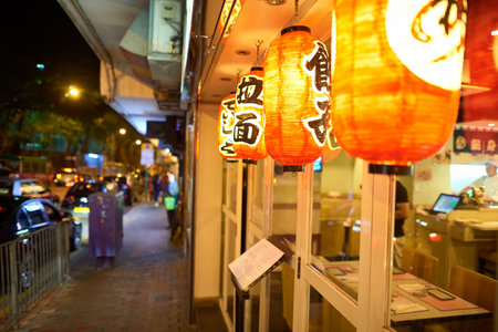 HONG KONG - OCTOBER 25, 2015: red lanterns outside a restaurant in Kennedy Town. Kennedy Town is at the western end of Sai Wan on Hong Kong Islandのeditorial素材