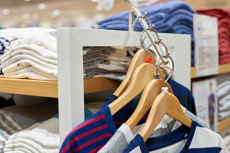 SINGAPORE - CIRCA SEPTEMBER, 2016: inside Uni Qlo store at Singapore Changi Airport. Uniqlo Co., Ltd. is a Japanese casual wear designer, manufacturer and retailer.のeditorial素材