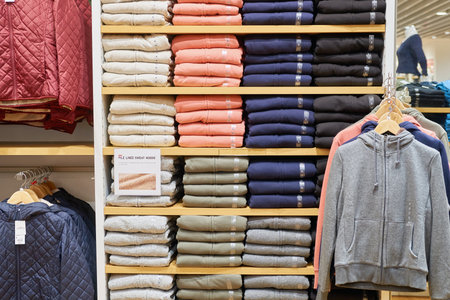 SINGAPORE - CIRCA SEPTEMBER, 2016: inside Uni Qlo store at Singapore Changi Airport. Uniqlo Co., Ltd. is a Japanese casual wear designer, manufacturer and retailer.のeditorial素材