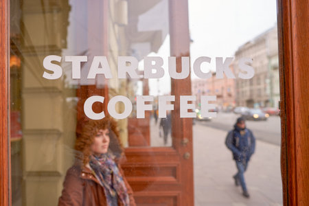 SAINT PETERSBURG, RUSSIA - CIRCA APRIL, 2017:  close up shot of Starbucks sign. Starbucks Corporation is an American coffee company and coffeehouse chain.のeditorial素材