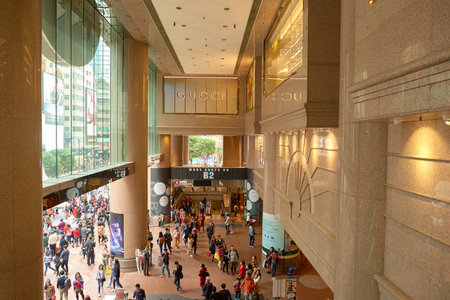 HONG KONG - CIRCA DECEMBER, 2015: people at Times Square. Times Square is a major shopping centre and office tower complex in Causeway Bay.のeditorial素材