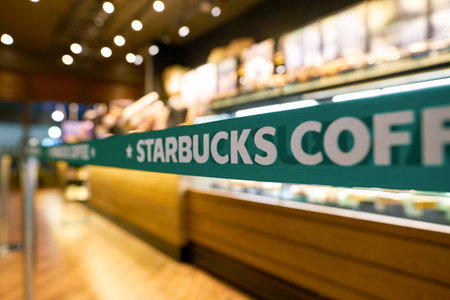 SEOUL, SOUTH KOREA - CIRCA MAY, 2017: close up shot of Starbucks sign. Starbucks Corporation is an...