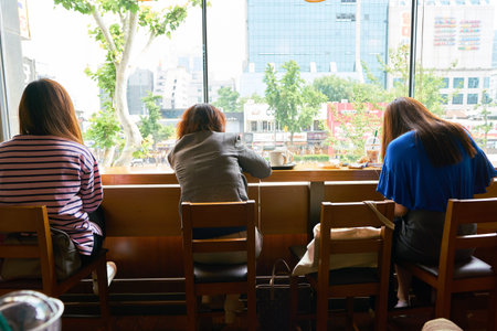 SEOUL, SOUTH KOREA - CIRCA MAY, 2017: inside Starbucks coffee shop in Seoul. Starbucks Corporation is an American coffee company and coffeehouse chain.のeditorial素材