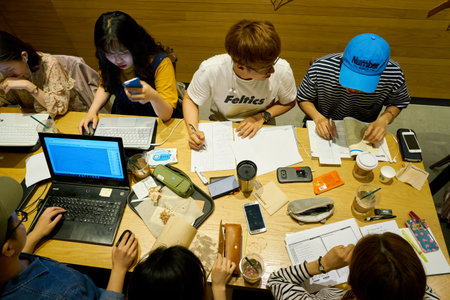 SEOUL, SOUTH KOREA - CIRCA MAY, 2017: people at Starbucks in Seoul. Starbucks Corporation is an American coffee company and coffeehouse chain.のeditorial素材