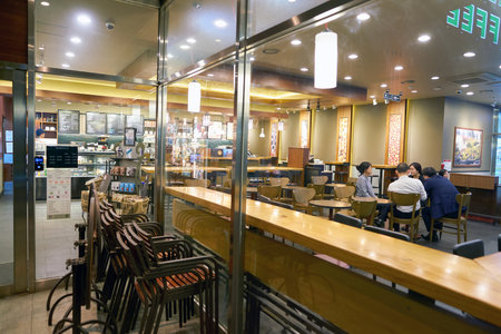 SEOUL, SOUTH KOREA - CIRCA MAY, 2017: Starbucks coffee shop in Seoul. Starbucks Corporation is an...