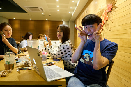 SEOUL, SOUTH KOREA - CIRCA MAY, 2017: people at Starbucks in Seoul. Starbucks Corporation is an American coffee company and coffeehouse chain.のeditorial素材