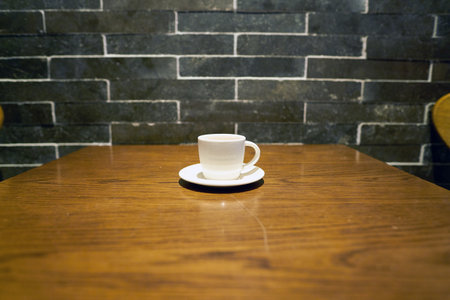 SEOUL, SOUTH KOREA - CIRCA MAY, 2017: a cup of coffee on a table in Starbucks. Starbucks Corporation is an American coffee company and coffeehouse chain.のeditorial素材