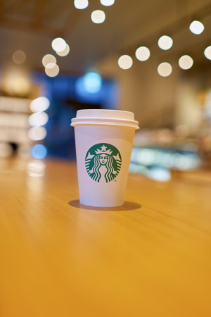 SEOUL, SOUTH KOREA - CIRCA JUNE, 2017: close up shot of Starbucks coffee take away cup. Starbucks Corporation is an American coffee company and coffeehouse chain.のeditorial素材