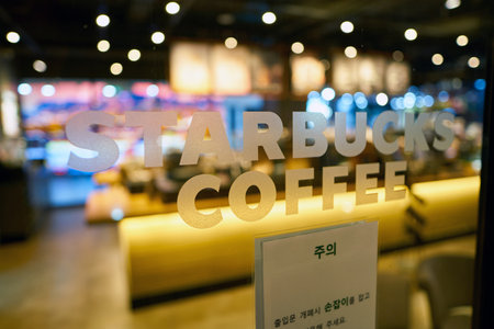 SEOUL, SOUTH KOREA - CIRCA MAY, 2017: Starbucks coffee shop in Seoul. Starbucks Corporation is an American coffee company and coffeehouse chain.のeditorial素材
