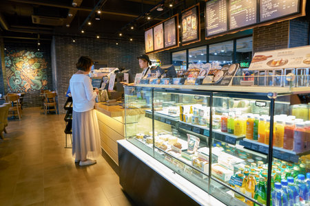 SEOUL, SOUTH KOREA - CIRCA MAY, 2017: display case at Starbucks in Seoul. Starbucks Corporation is an American coffee company and coffeehouse chain.のeditorial素材