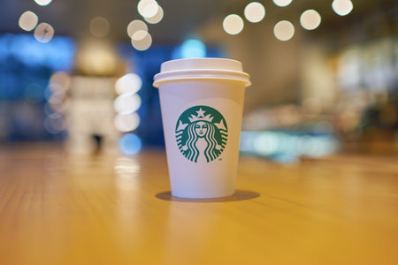 SEOUL, SOUTH KOREA - CIRCA JUNE, 2017: close up shot of Starbucks coffee take away cup. Starbucks Corporation is an American coffee company and coffeehouse chain.のeditorial素材