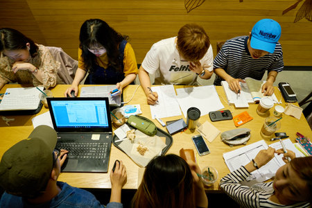 SEOUL, SOUTH KOREA - CIRCA MAY, 2017: people at Starbucks in Seoul. Starbucks Corporation is an American coffee company and coffeehouse chain.のeditorial素材