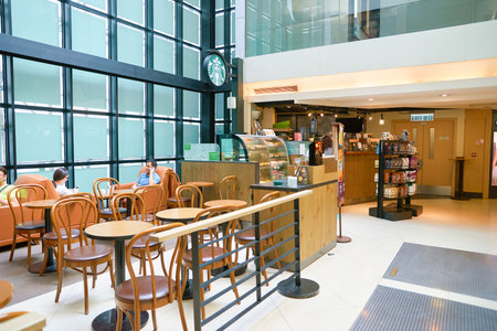HONG KONG - CIRCA SEPTEMBER, 2016:  Starbucks coffee shop in Hong Kong. Starbucks Corporation is an American coffee company and coffeehouse chain.のeditorial素材