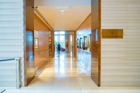 HONG KONG - CIRCA SEPTEMBER, 2016: entryway to Four Seasons Hotel Hong Kong. Four Seasons Hotel Hong Kong is a five-star hotel building in the Sun Hung Kai Properties.のeditorial素材