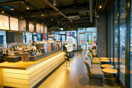 SEOUL, SOUTH KOREA - CIRCA MAY, 2017: inside Starbucks in Seoul. Starbucks Corporation is an American coffee company and coffeehouse chain.のeditorial素材