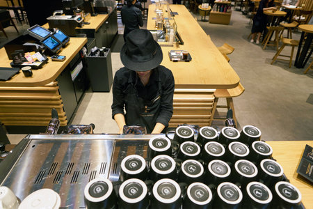 SEOUL, SOUTH KOREA - CIRCA MAY, 2017: worker at Starbucks Reserve. Starbucks Corporation is an...