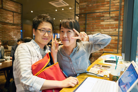 SEOUL, SOUTH KOREA - CIRCA MAY, 2017: people at Starbucks in Seoul. Starbucks Corporation is an American coffee company and coffeehouse chain.のeditorial素材