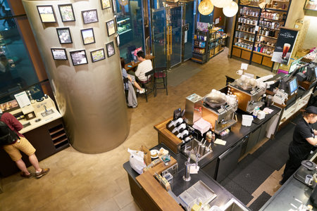 SEOUL, SOUTH KOREA - CIRCA MAY, 2017: inside Starbucks in Seoul. Starbucks Corporation is an American coffee company and coffeehouse chain.のeditorial素材