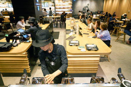 SEOUL, SOUTH KOREA - CIRCA MAY, 2017: worker at Starbucks Reserve. Starbucks Corporation is an...