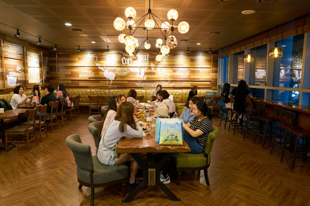 SEOUL, SOUTH KOREA - CIRCA MAY, 2017: inside Starbucks in Seoul. Starbucks Corporation is an American coffee company and coffeehouse chain.のeditorial素材