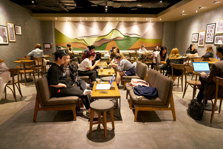 SEOUL, SOUTH KOREA - CIRCA MAY, 2017: inside Starbucks in Seoul. Starbucks Corporation is an American coffee company and coffeehouse chain.のeditorial素材